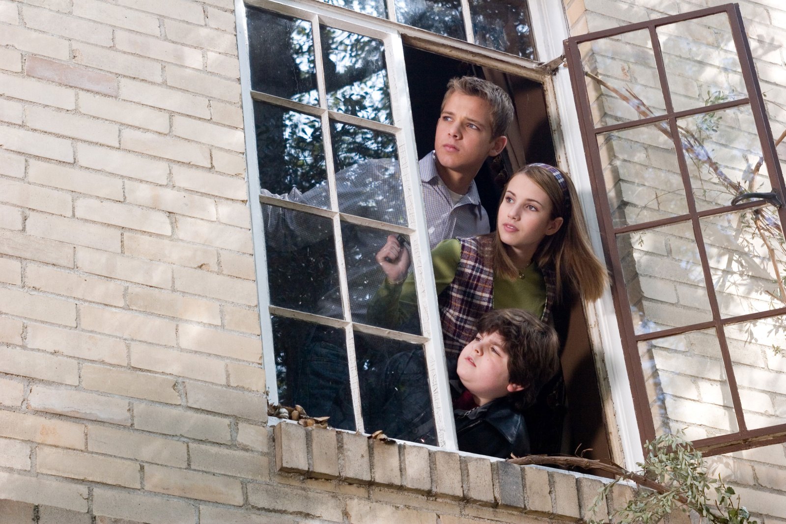 Emma Roberts as Nancy Drew, Max Thieriot as Ned Nickerson and Josh Flitter as Corky Veinshtein